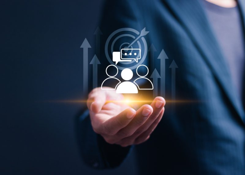 Businessman,Holding,Virtual,Target,Customer,Icon,For,Customer,Focus,Group